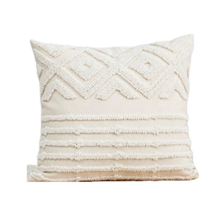 Close-up of boho style scatter cushion with detailed white embroidery, perfect for bedroom decor in South Africa